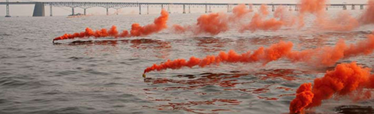 Orange Smoke Signal in Water