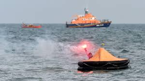 Person in Liferaft with Red Flare