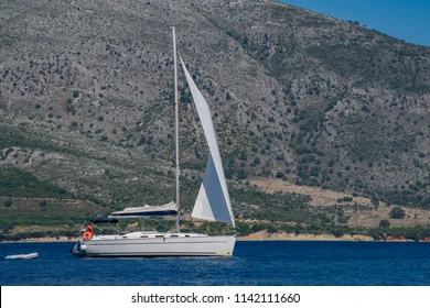 Sailing under jib only, mainsail down